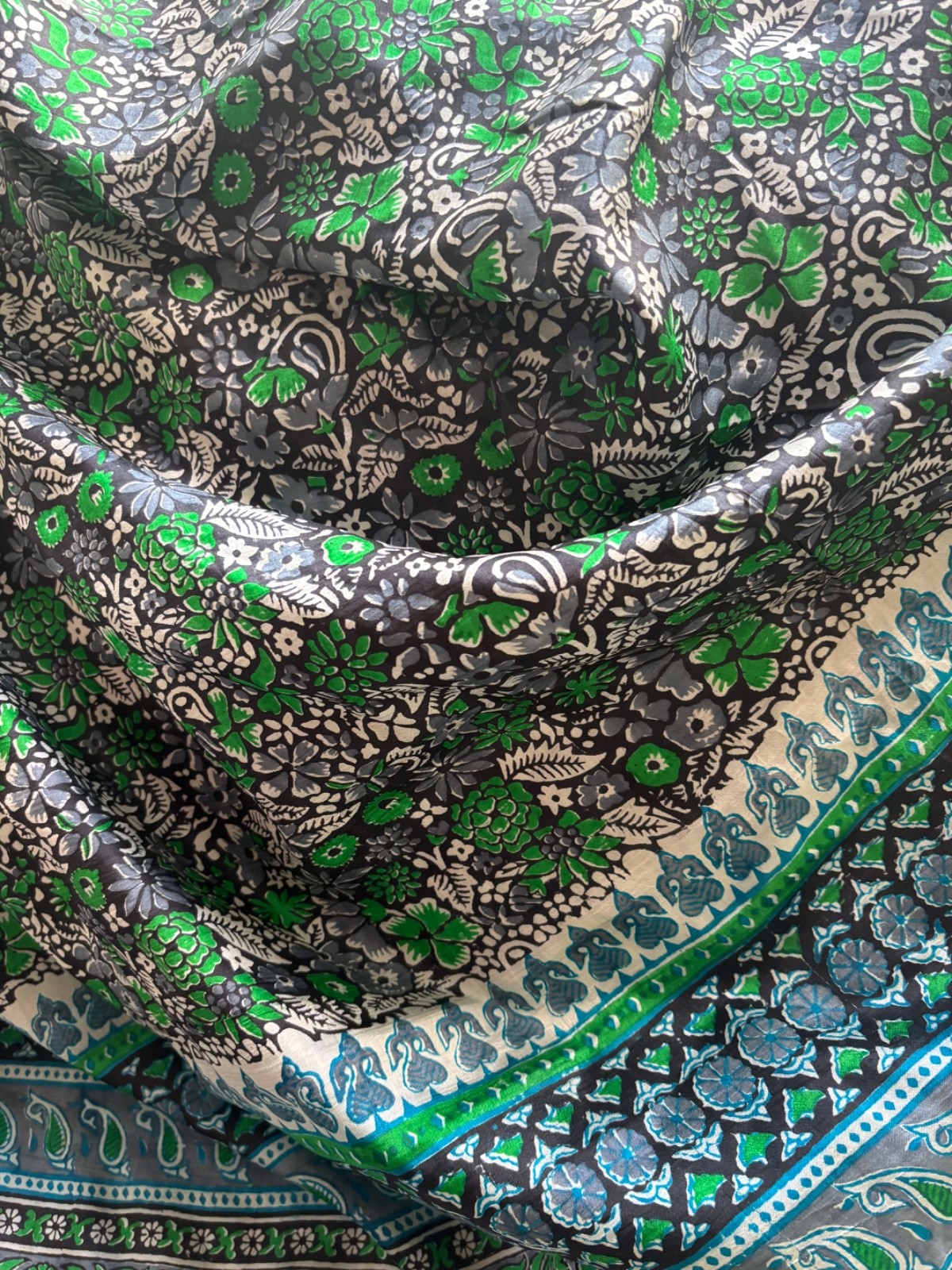 Beautiful printed soft silk saree without pico and fall, it has tiny spot pallu.