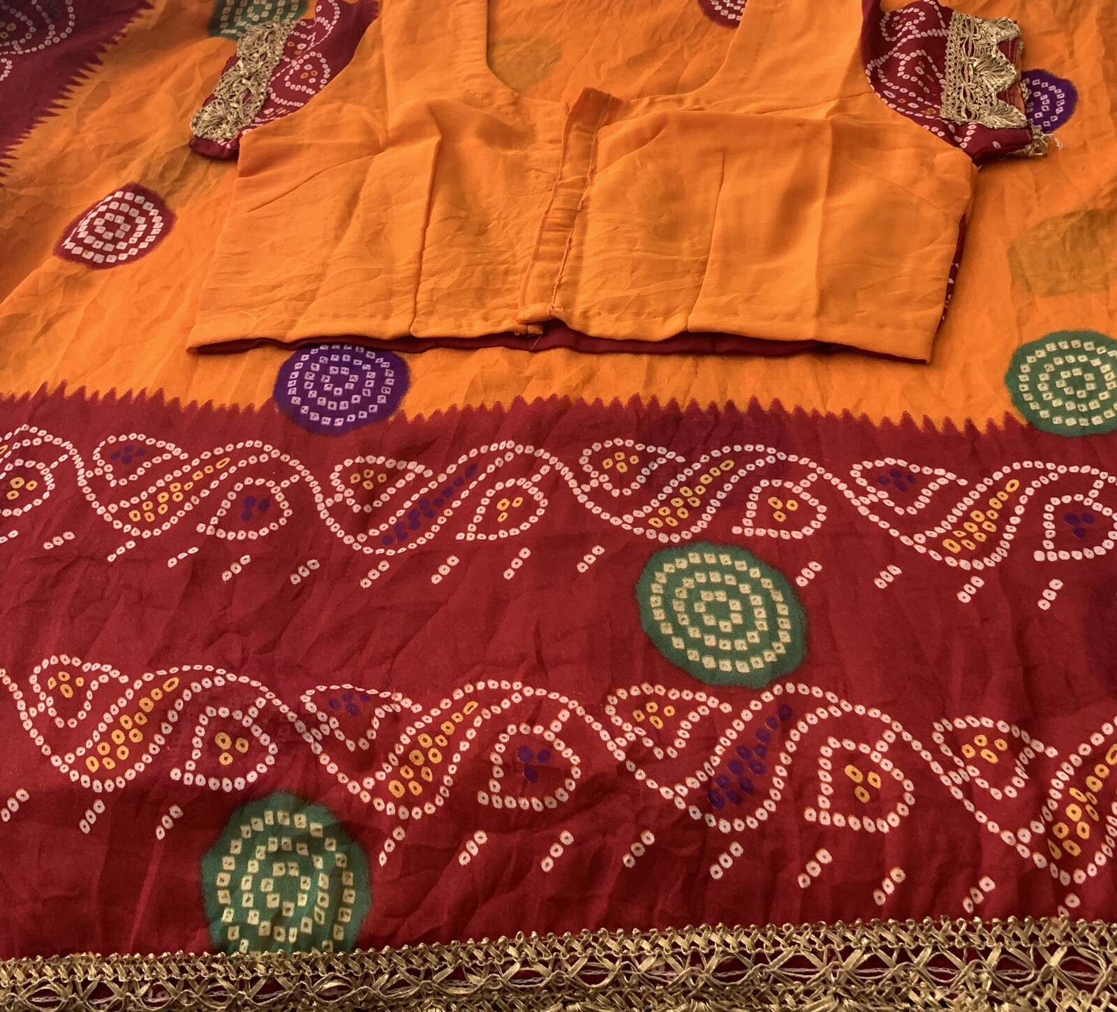 Orange and Dark Maroon/Red Tie and Dye Crepe Saree with Gold Lace Border