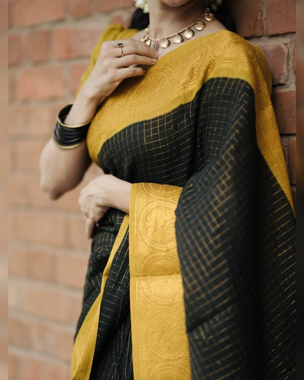 Timeless Black Silk Saree with Yellow Gold Border – Traditional Collection
