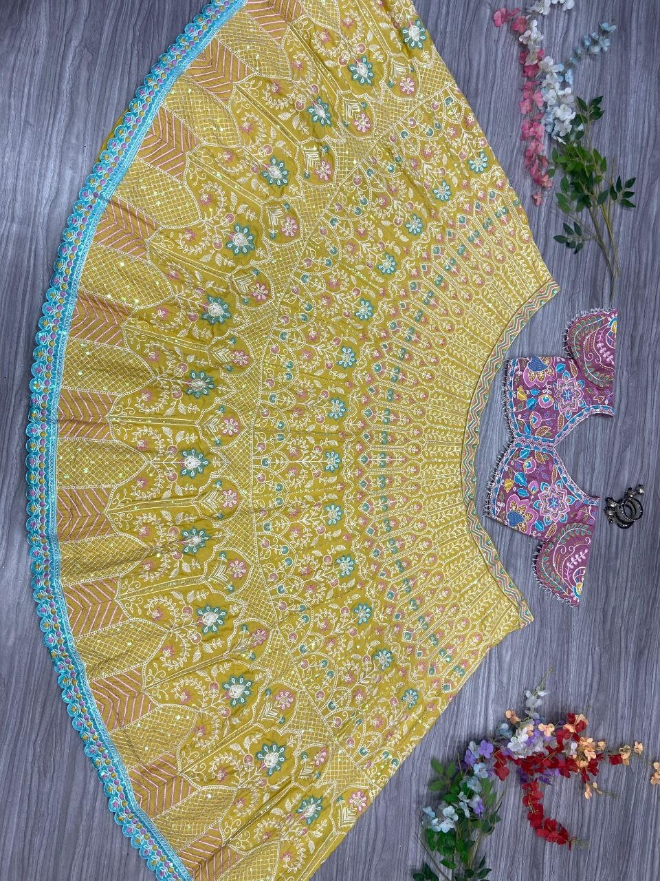 Latest Kasturi Silk Yellow Lehenga Choli With Net Dupatta For Reception Wear