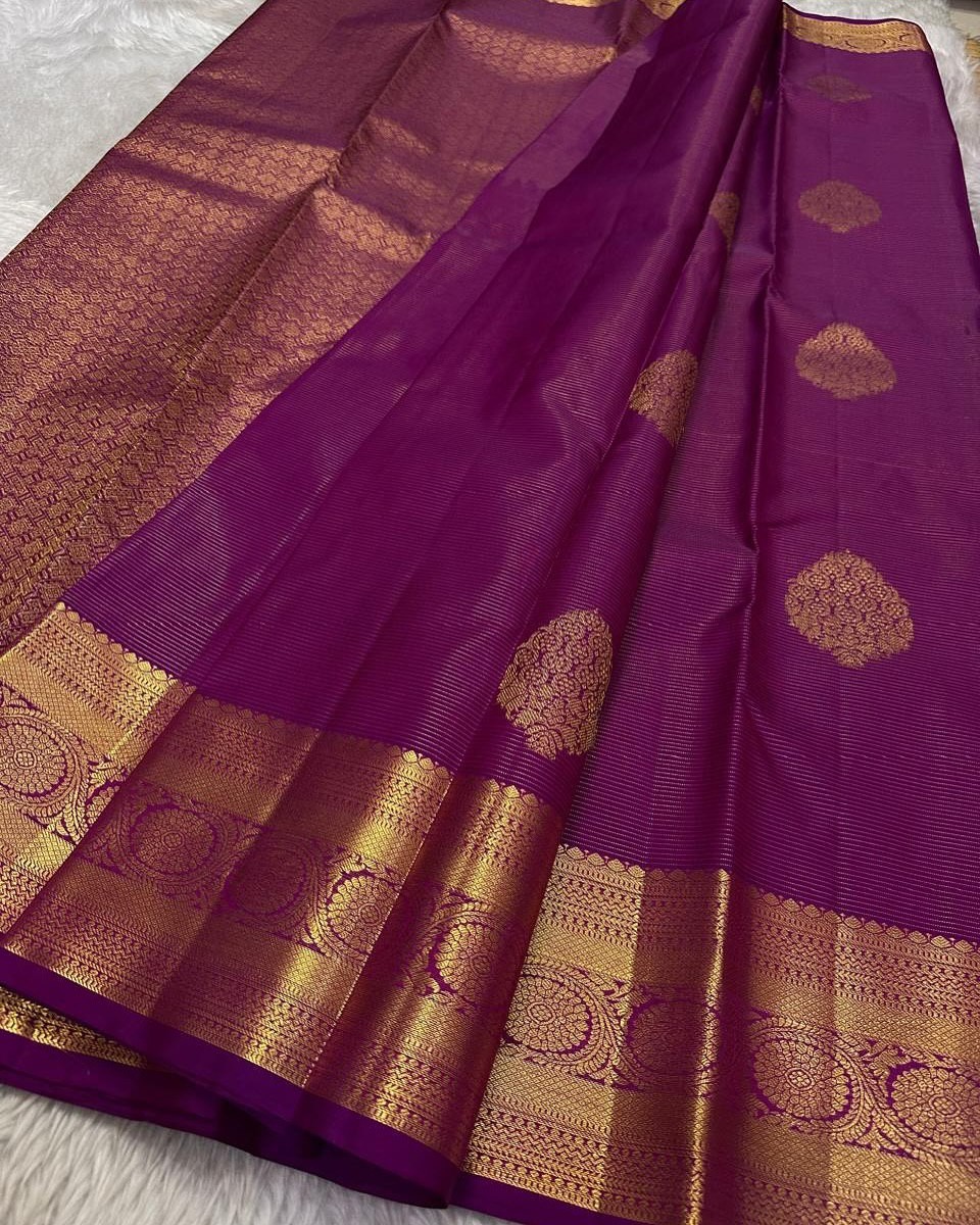 Vibrant Magenta Silk Saree with Antique Gold Zari Border and Leaf Butta
