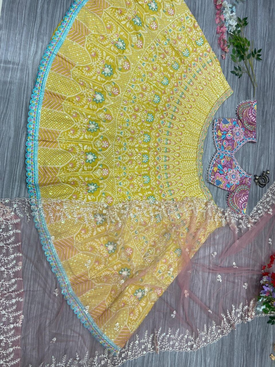 Latest Kasturi Silk Yellow Lehenga Choli With Net Dupatta For Reception Wear