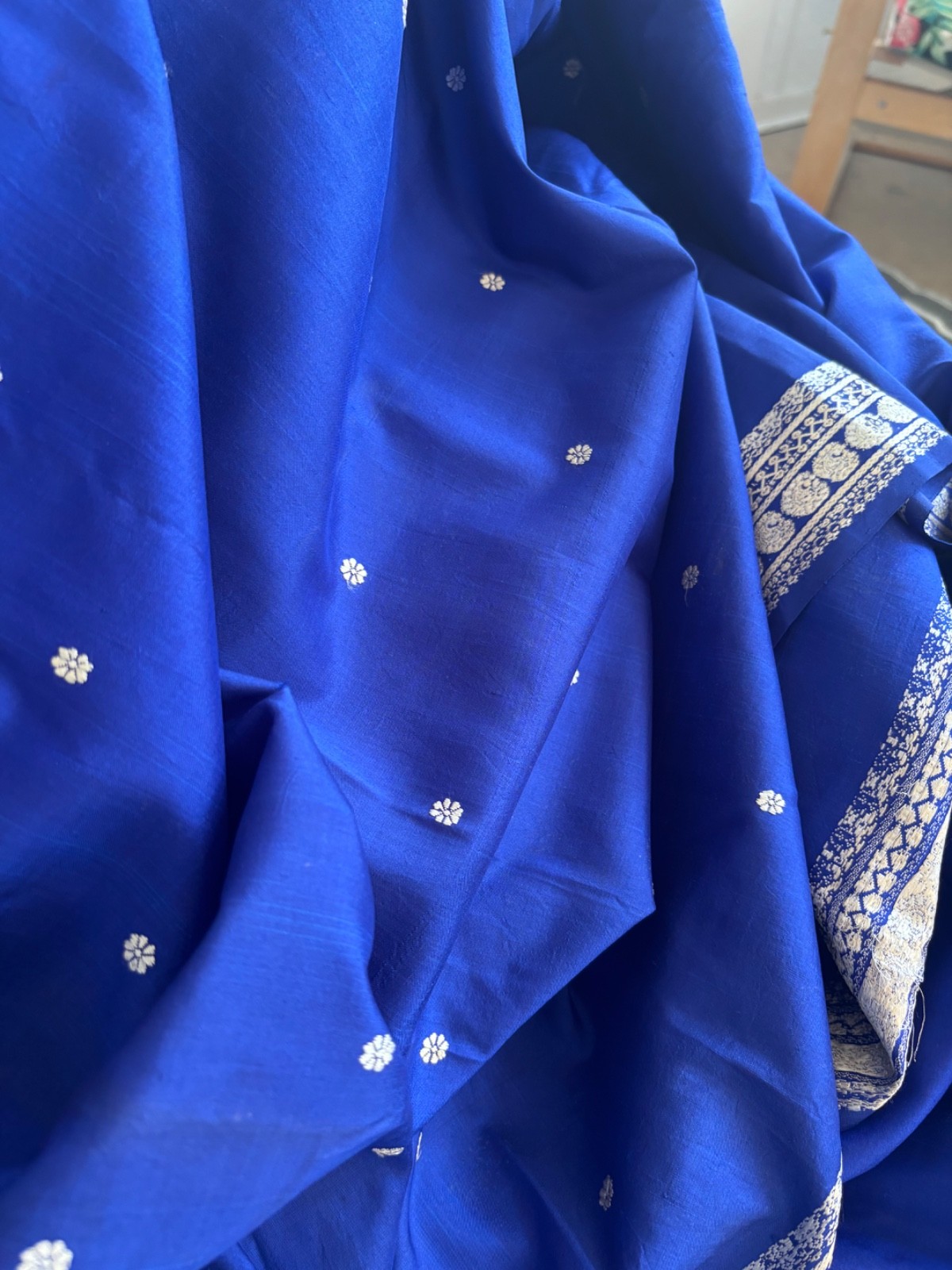Royal blue and cream color Bomkai sari with fall & pico it has tiny hole & spots