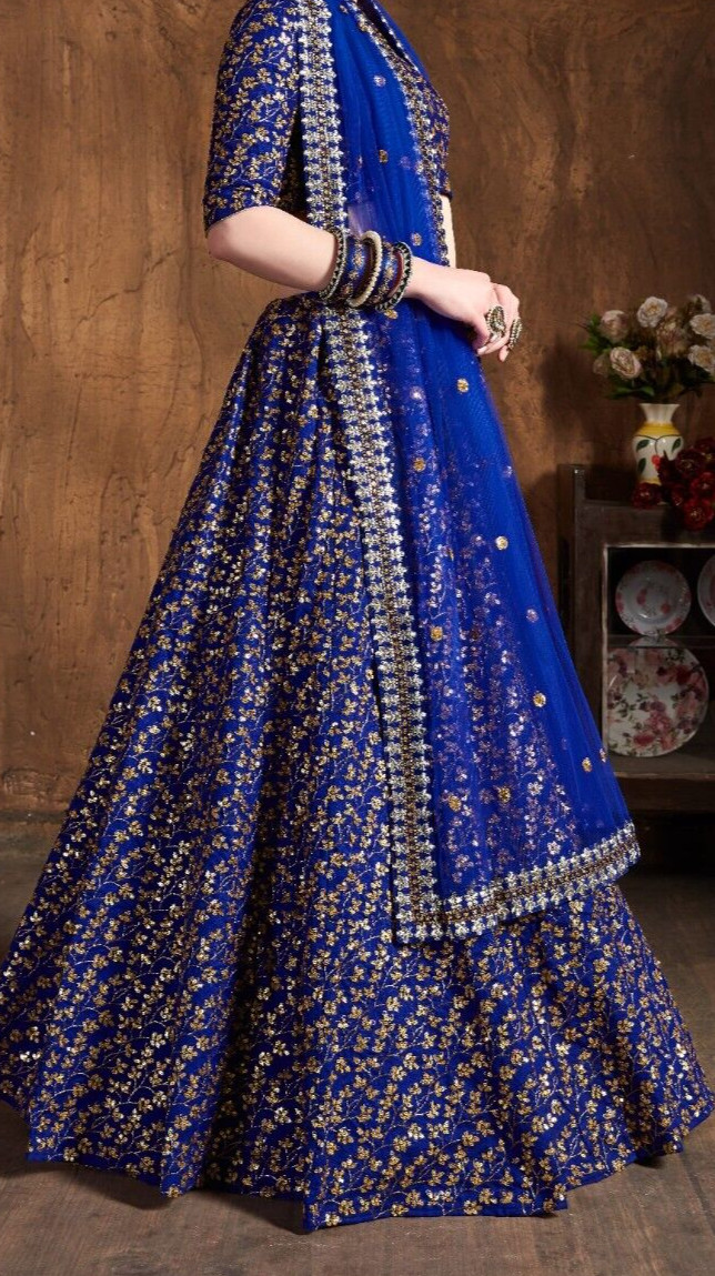 Pakistani Style Royal Blue Raw Silk Lehenga Choli And Soft Net Dupatta For Party