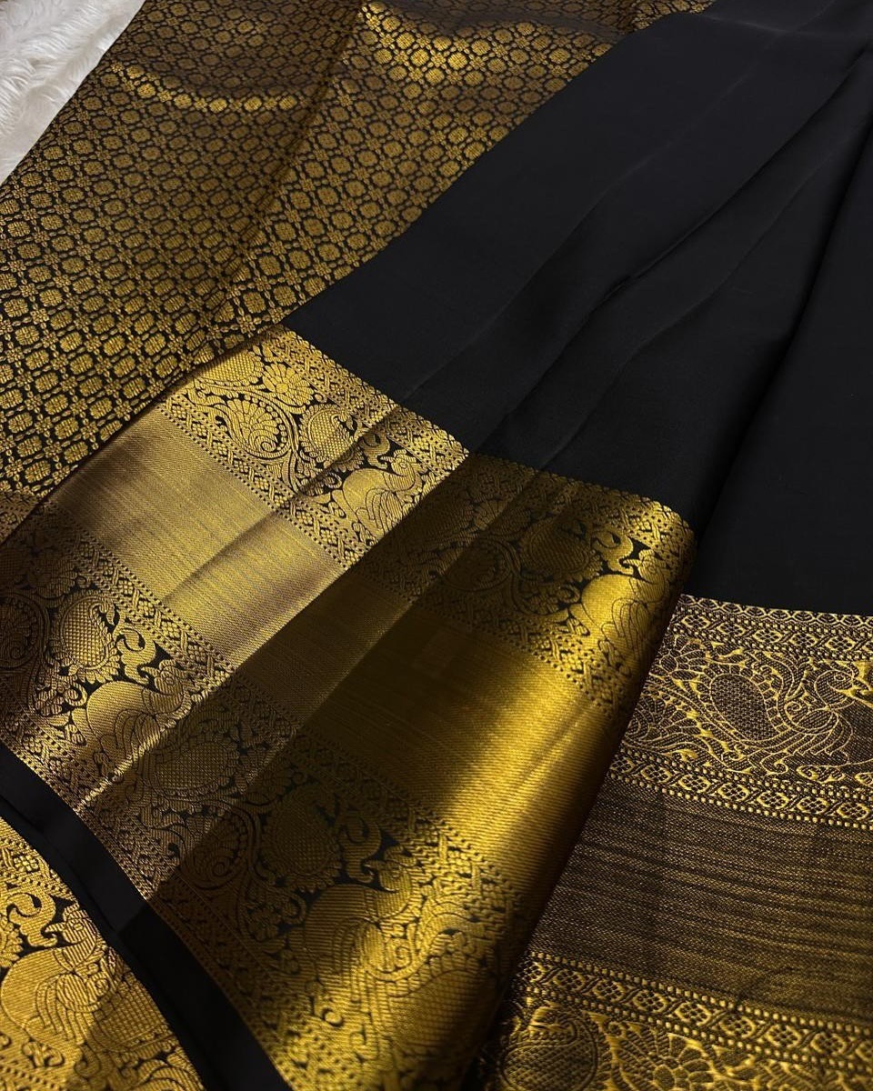 Regal Black Soft Silk Saree with All-Over Golden Zari Design ✨