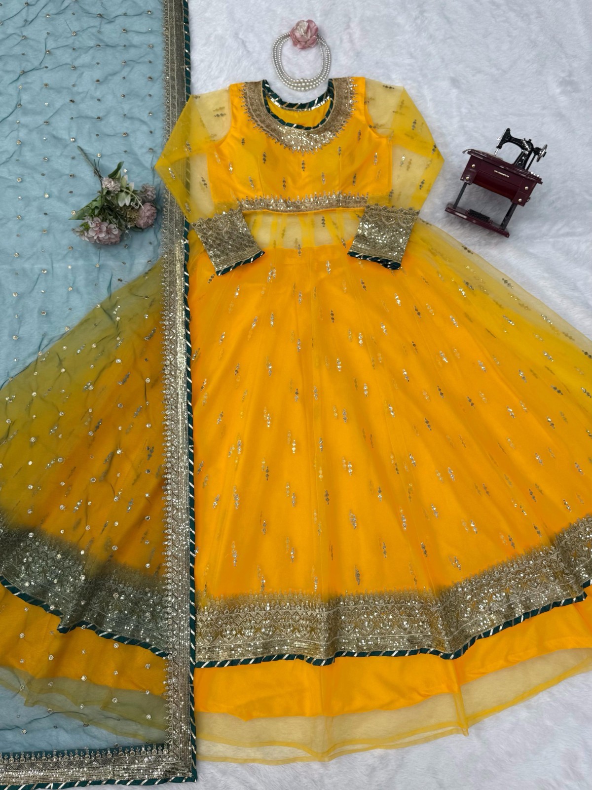 Bollywood Style Soft Net Yellow Top Lehenga With Dupatta For Reception Wear