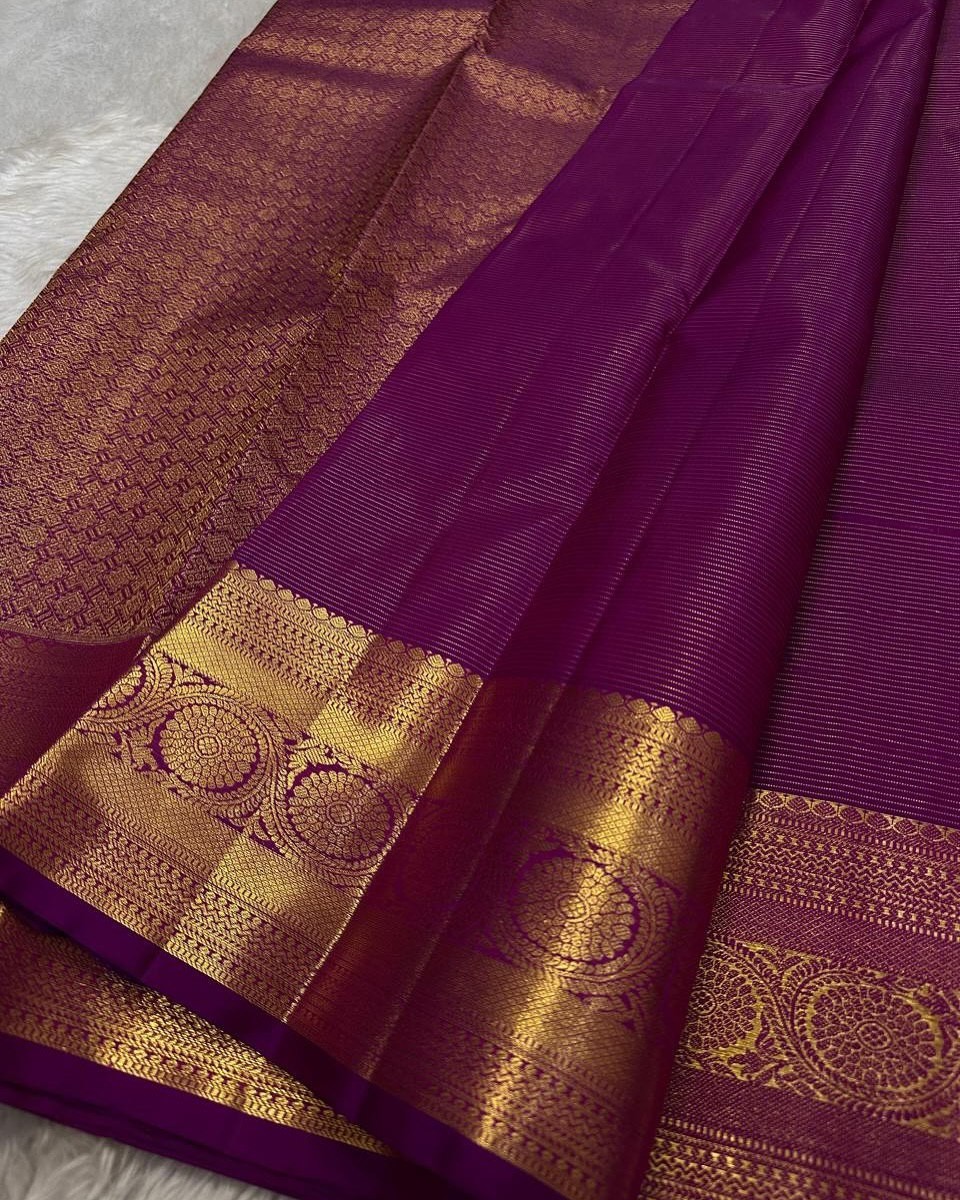 Vibrant Magenta Silk Saree with Antique Gold Zari Border and Leaf Butta