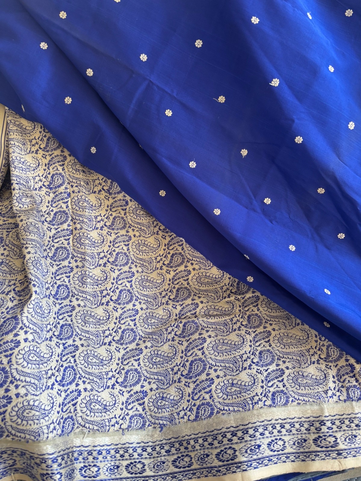 Royal blue and cream color Bomkai sari with fall & pico it has tiny hole & spots