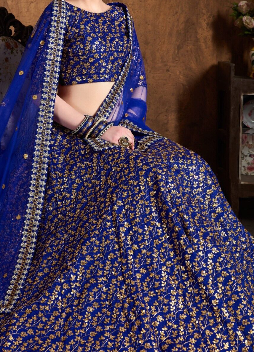Pakistani Style Royal Blue Raw Silk Lehenga Choli And Soft Net Dupatta For Party