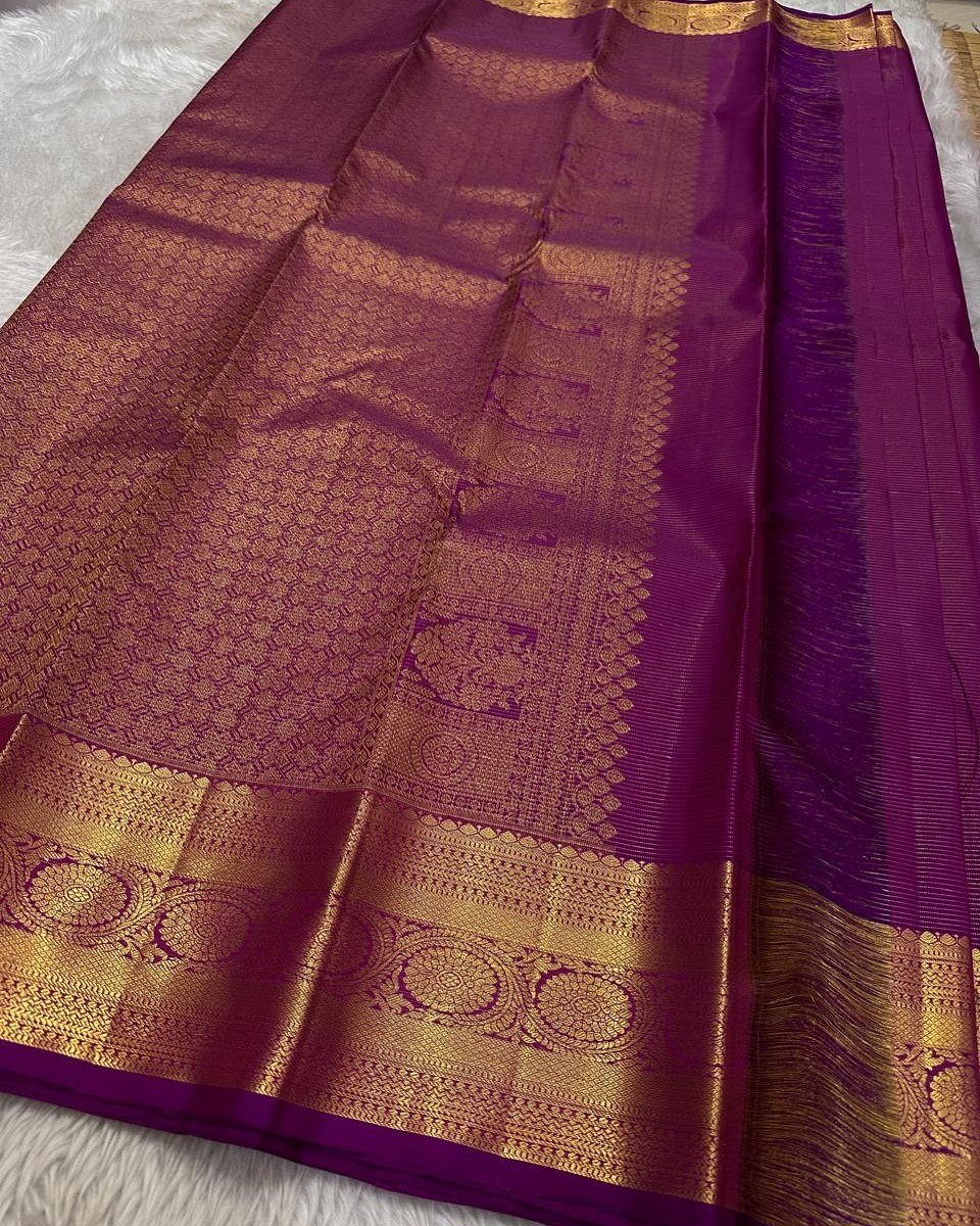 Vibrant Magenta Silk Saree with Antique Gold Zari Border and Leaf Butta